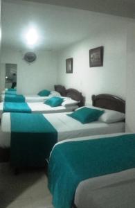 Postel nebo postele na pokoji v ubytování Hotel Center