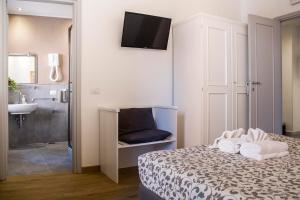 Posteľ alebo postele v izbe v ubytovaní Dulcis In Vatican b&b + 37 fotografií