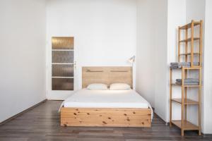 A bed or beds in a room at Best View Apartments