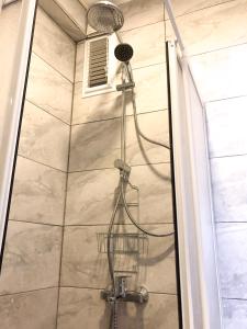 a shower in a bathroom with a shower at 6 Hane Üsküdar Serviced Apartments in Istanbul