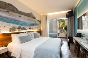 Postel nebo postele na pokoji v ubytování Atrium Ambiance Hotel