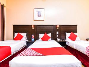 Postel nebo postele na pokoji v ubytování Melody Queen Hotel by AURA