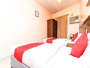 Postel nebo postele na pokoji v ubytování Melody Queen Hotel by AURA