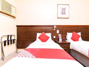 Postel nebo postele na pokoji v ubytování Melody Queen Hotel by AURA