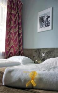 Expolis Residence - City Center - 24h #betterthanyourEX客房内的一张或多张床位
