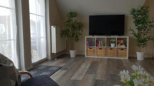 Afbeelding uit fotogalerij van Ferienapartment Wiese & Meer auf Rügen in Neddesitz +36 foto's