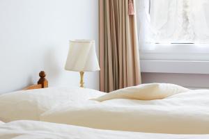 Voodi või voodid majutusasutuse Hotel & Spezialitätenrestaurant zur Linde toas