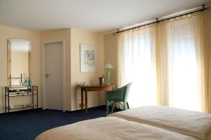 Katil atau katil-katil dalam bilik di Landhotel Schuff