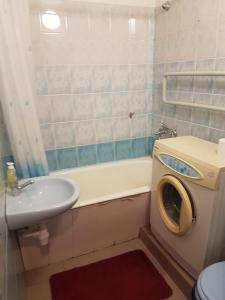 Ванная комната в Apartament Erfolg 1