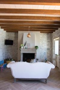 Televiisor ja/või meelelahutuskeskus majutusasutuses casAntica agriresort -Suites & Casa sull'albero