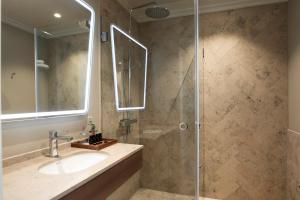 Koupelna v ubytování Elite Hotel Savoy