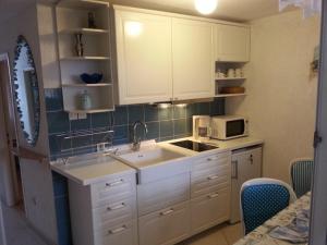 Köök või kööginurk majutusasutuses Blue Apartment