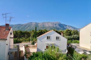 a view of the mountains from the roofs of houses at Loft Panorama in Korčula