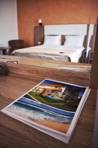 Postel nebo postele na pokoji v ubytování Valurile Mării Vama - Veche