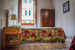 A bed or beds in a room at Hotel Medici