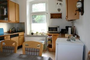 Een keuken of kitchenette bij Am Buchenberg