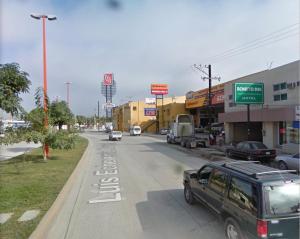 uma rua com carros estacionados na berma da estrada em BONITTO INN® Mante em El Mante