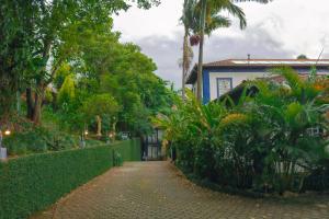 a walkway in front of a house at Pousada Xica da Silva in Tiradentes