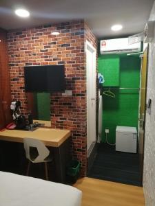 TV a/nebo společenská místnost v ubytování Qing yun resthouse Bandar, Brunei Darussalam