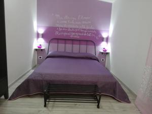 Postel nebo postele na pokoji v ubytování B&B La Collina Dei Poeti