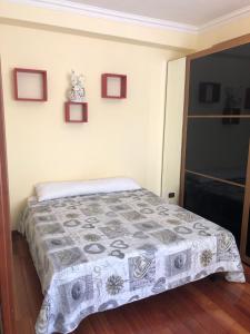 Ένα ή περισσότερα κρεβάτια σε δωμάτιο στο Dulcis Home Montemario