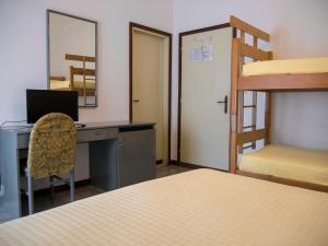 Postel nebo postele na pokoji v ubytování Hotel Casa Mia