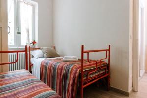 Posteľ alebo postele v izbe v ubytovaní La Quiete del Roero - Casa Vacanze nel verde