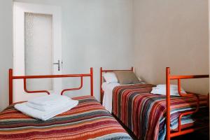 Posteľ alebo postele v izbe v ubytovaní La Quiete del Roero - Casa Vacanze nel verde