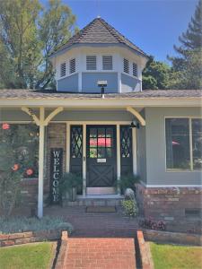 a home with a black door and a house at Stahlecker House Inn in Napa