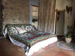 Postel nebo postele na pokoji v ubytování La Casa Del Teix