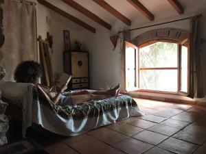 Postel nebo postele na pokoji v ubytování La Casa Del Teix