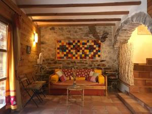 Posezení v ubytování La Casa Del Teix
