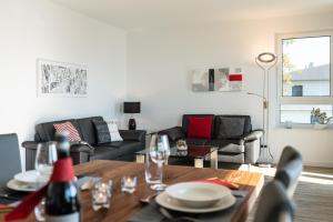 Ein Sitzbereich in der Unterkunft Appartement "Karat" mit Penthouseflair - Oase am Haff