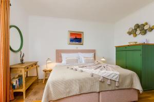 Postel nebo postele na pokoji v ubytování Villa La Vagabonda Apartment + 37 fotografií