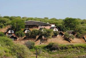 a small town with houses and trees at Von Bach Dam Resort in Okahandja