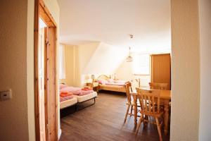Postel nebo postele na pokoji v ubytování Ferienparadies Mühlenbach