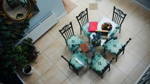 an overhead view of a table and chairs in a room at Cartron House in Ballynakill