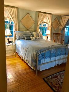 Ένα ή περισσότερα κρεβάτια σε δωμάτιο στο Scranton Seahorse Inn