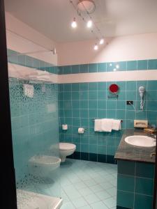 Kúpeľňa v ubytovaní Hotel Tessarin