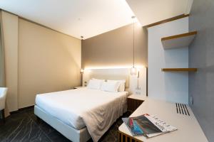 Postel nebo postele na pokoji v ubytování Hotel Milano Castello + 37 fotografií
