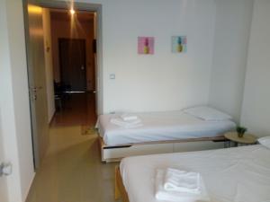 Postel nebo postele na pokoji v ubytování Ioannas