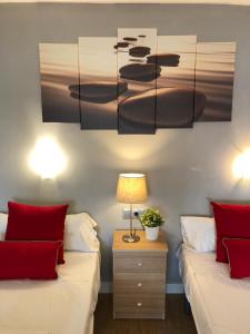 Кровать или кровати в номере BERMUDAS-TURIS Apartamentos