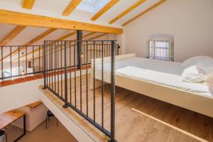 Ένα ή περισσότερα κρεβάτια σε δωμάτιο στο Apartmani Kraj mora