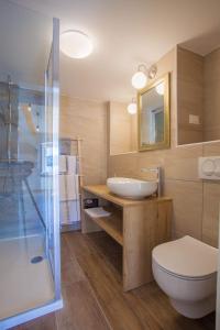 Koupelna v ubytování Apartmani Kraj mora