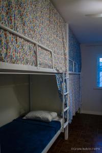 Postel nebo postele na pokoji v ubytování Bela Curitiba Hostel