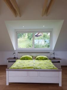 Postel nebo postele na pokoji v ubytování Garden Apartments Maria