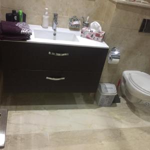 a bathroom with a sink and a toilet at B-LBAIT Agadir Morning light for Family in Agadir