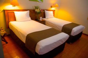 Postel nebo postele na pokoji v ubytování DM Hoteles Mossone - Ica