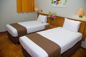 Postel nebo postele na pokoji v ubytování DM Hoteles Mossone - Ica