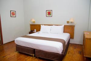 Postel nebo postele na pokoji v ubytování DM Hoteles Mossone - Ica